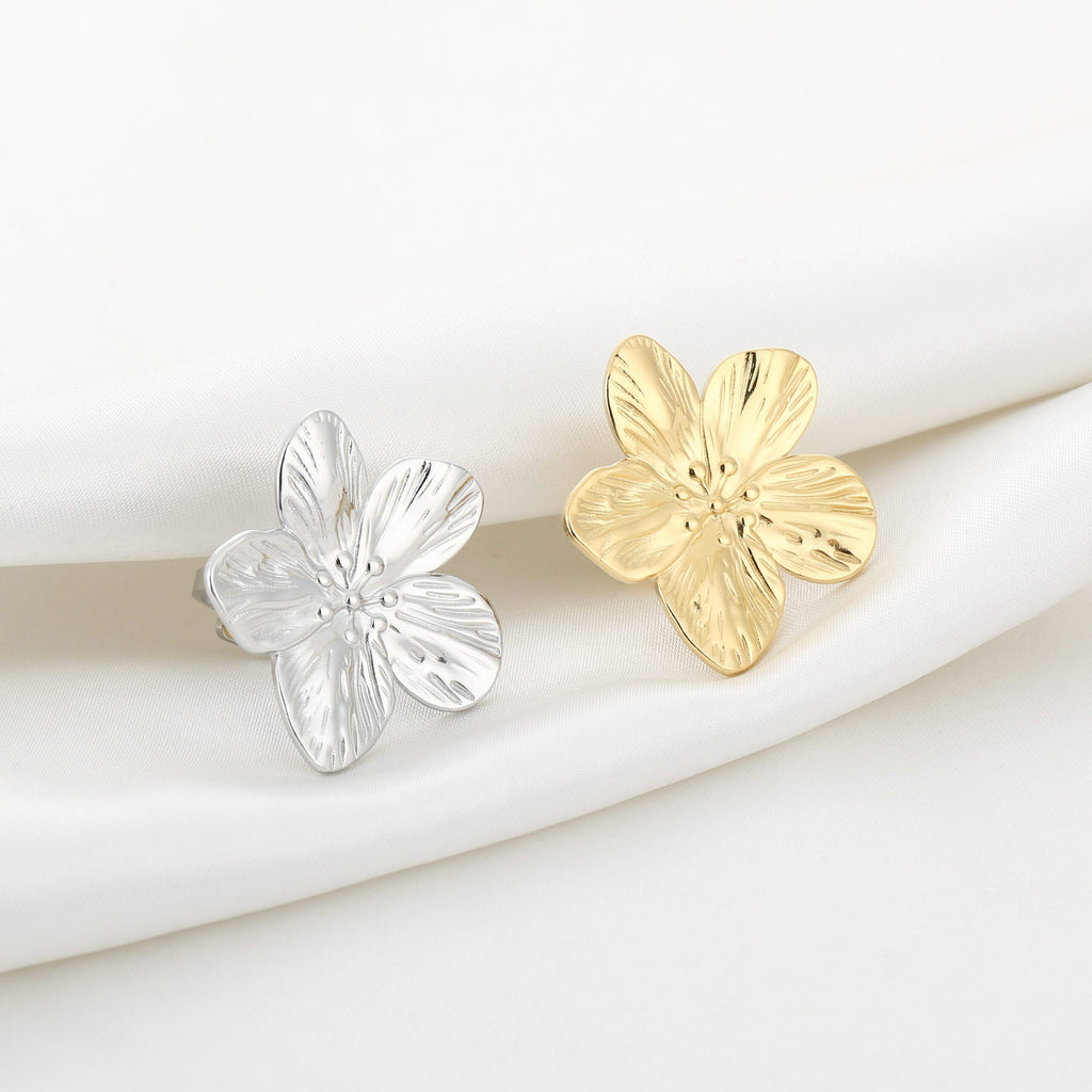 bloemen ring goud en zilver side by side