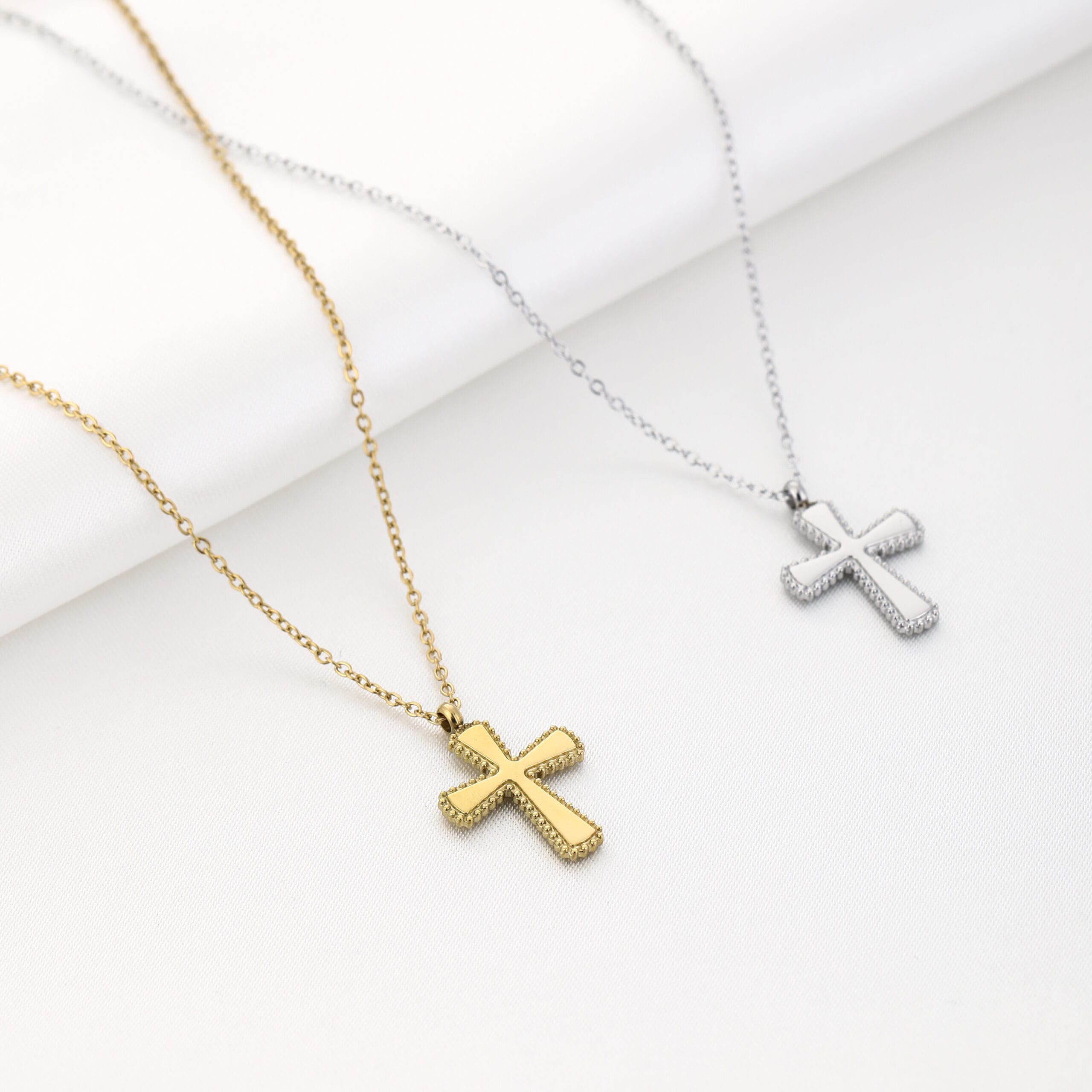 ketting kruisje goud en zilver