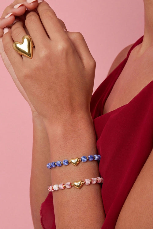 Armband van kralen met hartvormig centerpiece